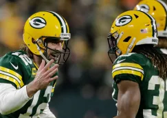 Rodgers y compañía celebran ante los Bears