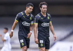 Jesús Molina y Antonio Briseño durante partido con Chivas en Liga MX