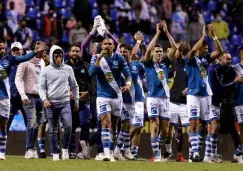 Puebla celebrando el triunfo ante Rayados 