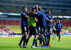 Jugadores del Querétaro festejando un gol a favor