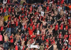 Afición rojinegra celebrando campeonato