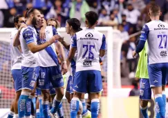 Jugadores de Puebla en festejo de gol