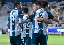 Jugadores de los Tuzos, en festejo de gol