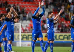 Jugadores de Rayados en festejo de gol