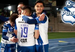 Jugadores de Puebla en festejo de gol