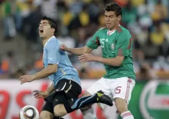 Moreno y Suárez en un partido del Mundial del 2010