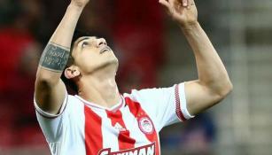 Pulido festeja su gol con Olympiacos