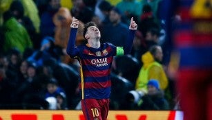 Lionel Messi festeja un gol con Barcelona