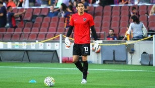 Ochoa durante trabajo de calentamiento con el Málaga