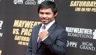 El boxeador Manny Pacquiao posando durante una promoción de la pelea entre el filipino y Mayweather