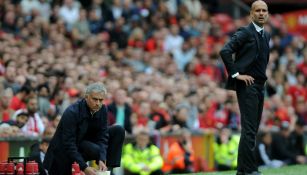 Guardiola y Mourinho observan el derbi de Manchester