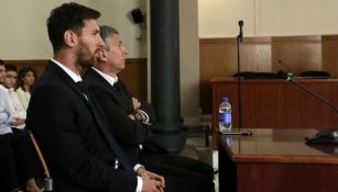 Lionel Messi y su padre, en la audiencia de Barcelona