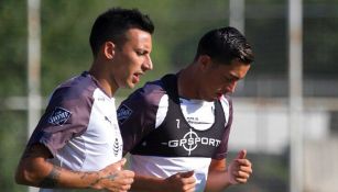 Leonel Vangioni y Funesmori en un entrenamiento de rayados