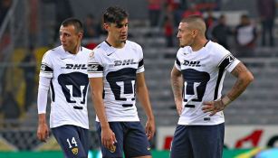 Van Rankin y Castillo hablan durante el juego entre Atlas y Pumas