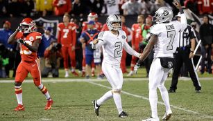 Giorgio Tavecchio y Marquette King celebran un TD