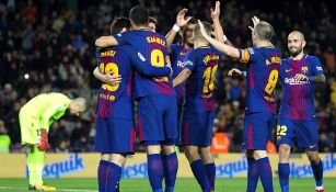 Jugadores del Barcelona festejan un gol contra el Deportivo