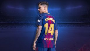 Coutinho posa con su nuevo dorsal 