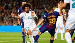 Marcelo y Jordi Alba durante el Clásico Español