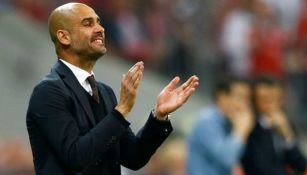 Guardiola aplaude durante un partido del City