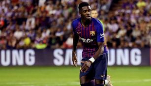 Dembélé corre en un juego del Barcelona