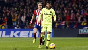 Rafinha disputa el duelo contra el Atlético 