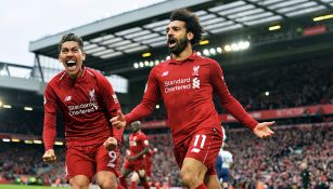 Roberto Firmino y Mohamed Salah celebrando un gol 