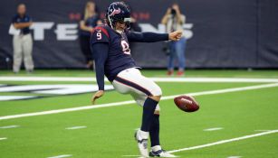 Shane Lechler durante un juego con los Texans