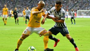 Luis Rodríguez y Carlos Rodríguez durante un Clásico Regio