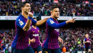 Suárez y Coutinho, en festejo de gol