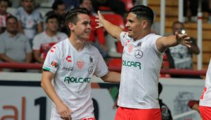 Jugadores de Necaxa celebran un gol