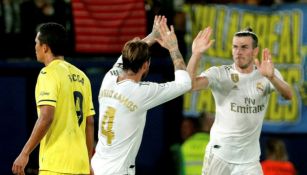 Gareth Bale celebra con Ramos uno de sus goles en el partido