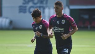 Hiram Mier junto a la Chofis López en un entrenamiento