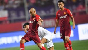 Mascherano en un juego en la Superliga China 