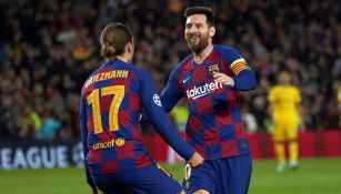 Messi celebra con Griezmann su gol ante el Dortmund 