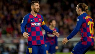 Messi y Griezmann celebran un tanto del Barcelona 