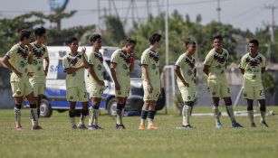 Jugadores de América Sub 17 durante un partido  