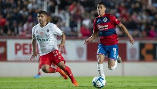 Uriel Antuna en acción con Chivas