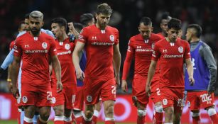 Jugadores de Toluca en partido de la Liga MX