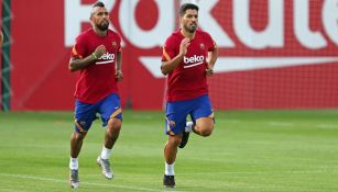 Arturo Vidal y Luis Suárez en un entrenamiento con el Barcelona 