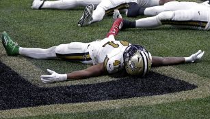 Alvin Kamara tras su última anotación del juego de Saints