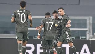 Jugadores del United celebran gol vs la Real Sociedad