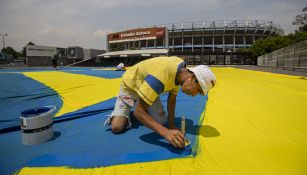 La preparación de la mega manta para el América