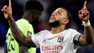 Memphis Depay celebra un gol con el Olympique de Lyon