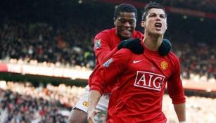 Evra y Cristiano durante un partido del United