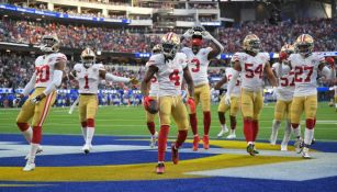 Jugadores de 49ers en festejo