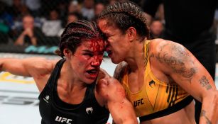 Amanda Nunes y Julianna Peña en combate