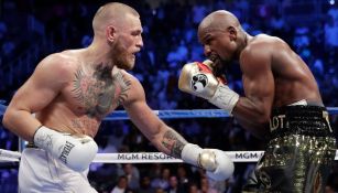 McGregor y Mayweather en su anterior combate  