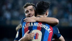 Lewandowski y Sergi Roberto festejan un gol