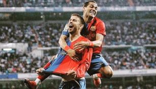 Dani Alves y Gerard Piqué