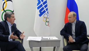 Presidente de Rusia Vladimir Putin con el presidente del Comité Olímpico Internacional Thomas Bach
